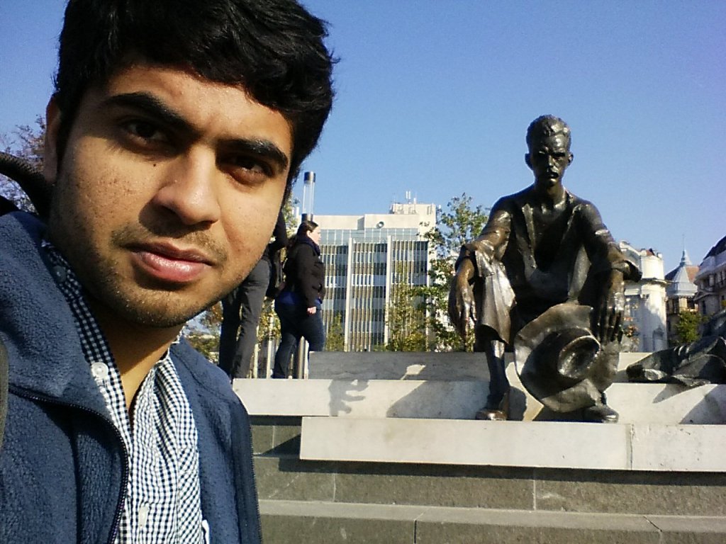 Gobi Dasu with a working Hungarian holding his hat